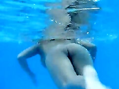 Underwater strip of handsome tits