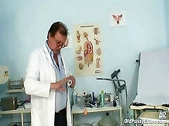 Aged lady Mila visiting obgyn doctor for pussy speculum examination on gynochair