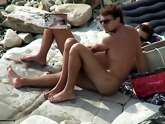 Breasty superslut sucking cock on a beach