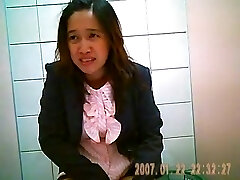 Hidden webcam in thai office toilet