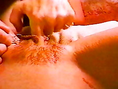 A one of a kind pierced stunner hot her vag lips spread