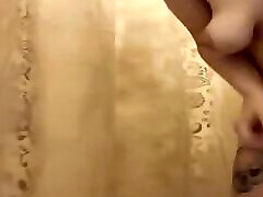 Milf sneaks a squirt in the shower