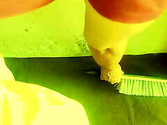 A woman becomes in the mood for sex while cleaning the house