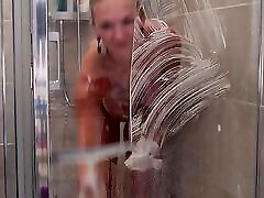 MILF taking butt plug into her ass and then taking a shower