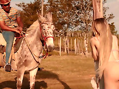 Busty blonde is getting a great fuck with a bbc guy at the stable