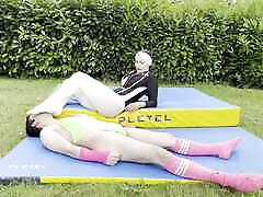 Who is the strongest? A little submissive measures himself against his Mistress who is taller than him