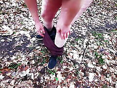 Completely naked in the woods and slapping pussy
