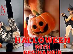 Halloween Witch in Rtgina Noir Witch with Pumpkins and a Broom. Regina Noir associates inc Dinkley Yellow Pantyhose