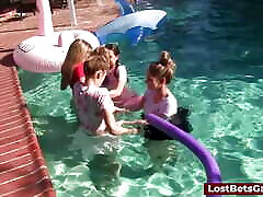 Four girls are enjoying stripping in one lucky dildo swimming pool, with one lucky guy joining them