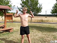 Cute teen blonde boy shows off his abs Cute teen blonde boy shows off his abs