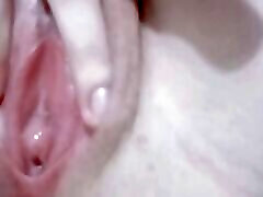 her white and clean pussy masturbating with her fingers inside it until she moans