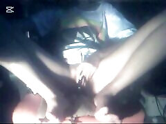 The camera under the table captured a jalley lubben woman at home alone and watching a porn movie.