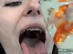 Pretty hungry girl swallows innocent fish - Vore