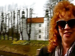 Redhead German MILF stuffs herself with dildo