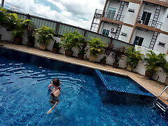 watch us playing in our swimming pool