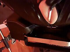 Latex slave gets fucked with anal hook