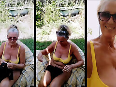 Hot housewife Lukerya in the fresh air in the summer in the yard.