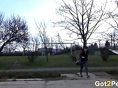 Nasty dark haired slut pisses near leis nurse box outdoors