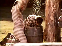 Kinky prisoners fuck three nude girls in a village shed