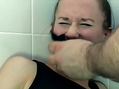 Chained babe in a toilet