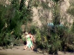 Spying on a sexy pair outdoors