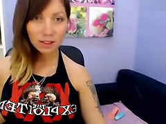 aTattooedCutie undresses and shows off her tattoo