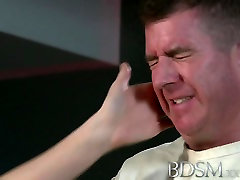Slave boy in straight jacket and anal hook swings brick from his balls to please his Mistress