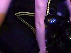 Rubber gimp restrained, hooded and fucked