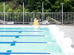 Japanese girl swim in loud gerboydy with yellow swimsuit soft