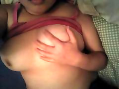 Ebony playing with her tits