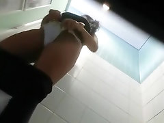 Pissing and making a suffering face