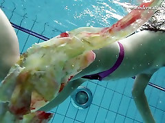 Hot swimming chick Krasula Fedorchuk takes off clothes under the water