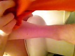 Putting on some orange tights and playing with my cock