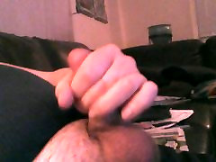 Bored short cum on the couch in pants