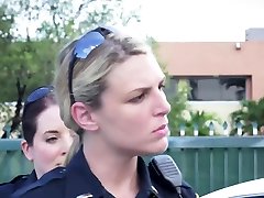 Horny milf cops take suspect out to an alley for hot sex