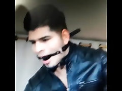 latino man ballgagged