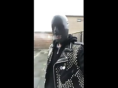 gimp in rubber hood