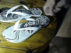 cumming on a flip-flop and wearing it