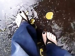 black toenail polish and black platform flip flops