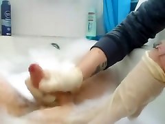 ванна перчатка латекса мастурбирует