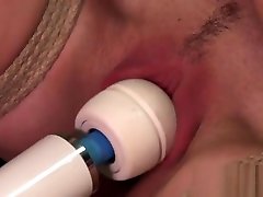 Tied up slave gets cunt vibrated and gagged