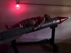 Wonder Woman Strapped to Rocket!
