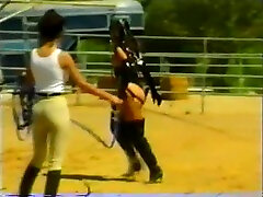 White chick in mandingo emily austin black leather BDSM outfit restrained on the farm