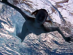 Petite white cute bitch all nude in the pool underwater