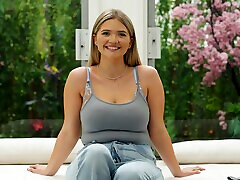 Chubby blonde Angie gets undressed and fucked on the bed during casting