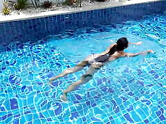 Thai girl sucks cock at the pool